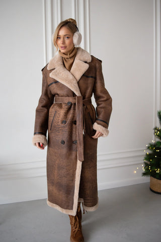 Beige midi-length shearling coat